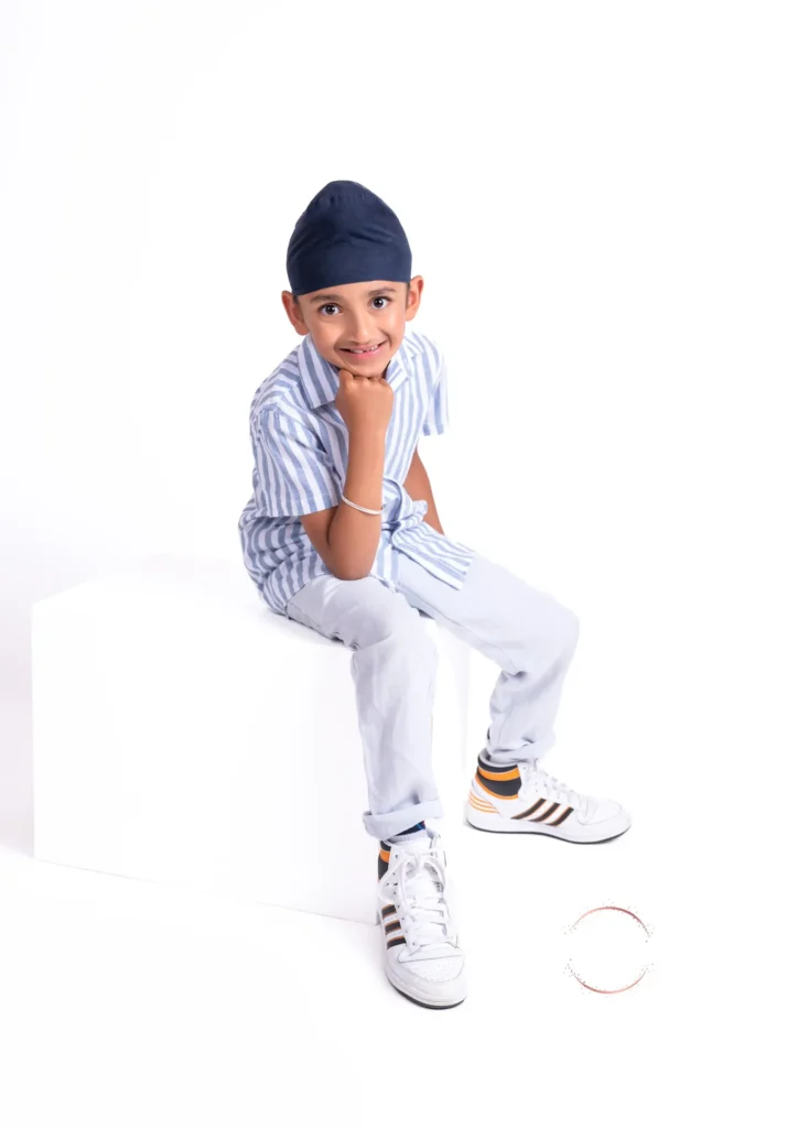 Photographer capturing the innocence of a toddler in a Wellington photo studio